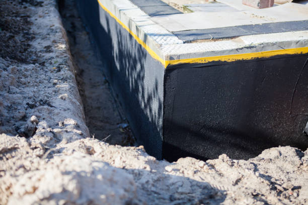 Professional Interior Drainage System technician working in Belleville, KS